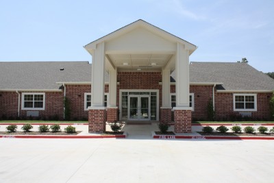 Building entrance with columns and drive thru